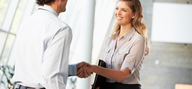 Professional women hand shake a professional men