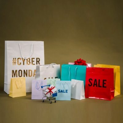 group of store bags read #CYBER Monday and SALE