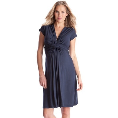 A lady wearing a maternity dress