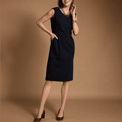 woman wears sleeveless work dress with pockets; she also has leopard-print heels and gold jewelry on